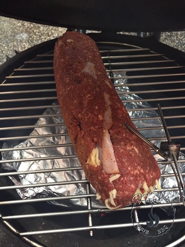 Deer fatty with rub on the grate