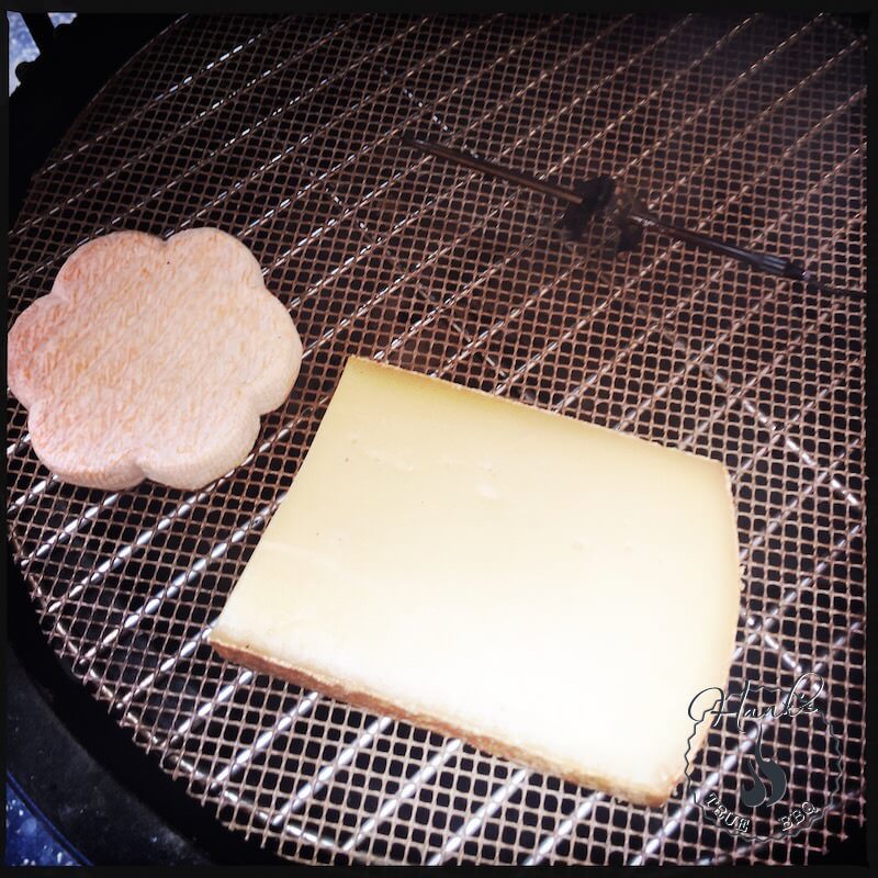 4. Place cheese on the grate