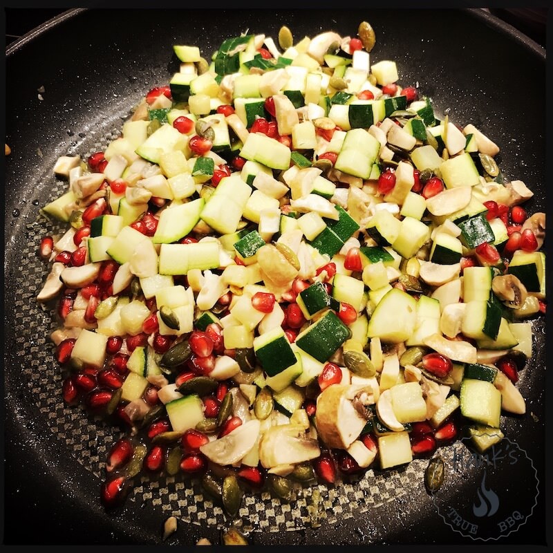 Zucchini salad in the frying pan