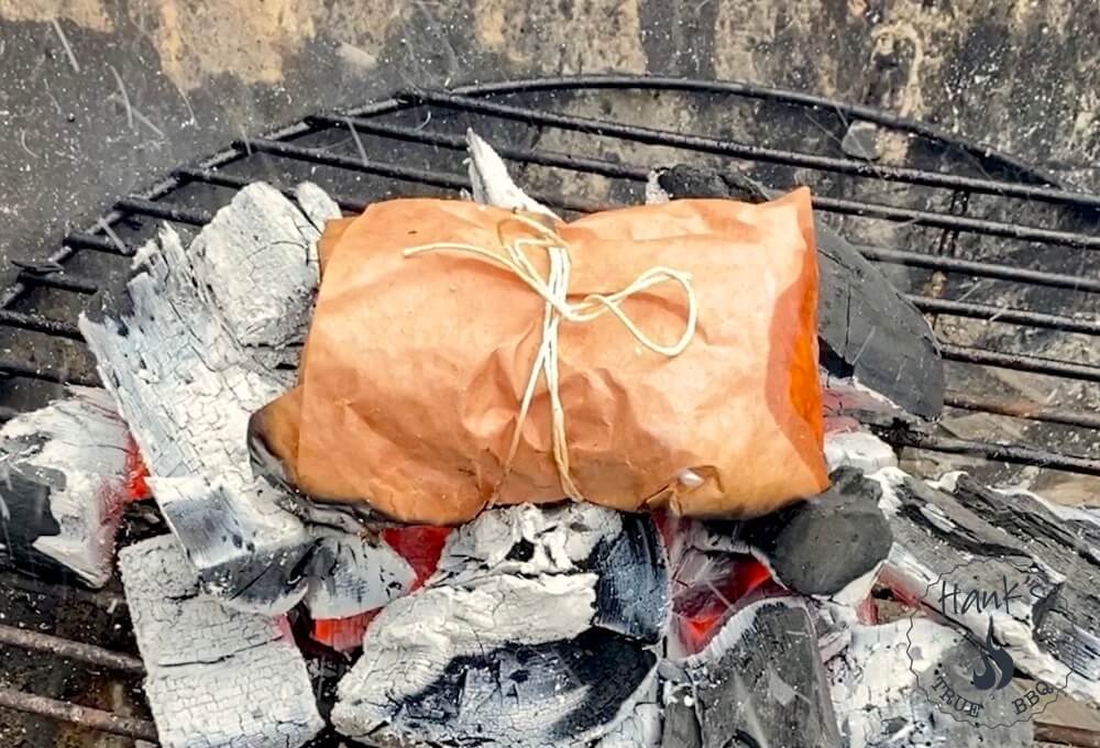 Cod in butcher's paper on the grill